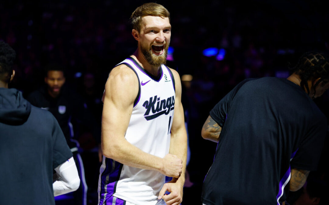 Kings defeat Jazz 105-104 in home opener