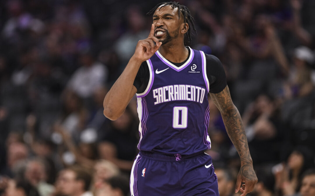 Kings win in tankoff against Nets